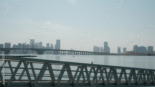 Abu Dhabi, United Arab Emirates - January 6, 2024: Louvre Abu Dhabi, showcasing its stunning modern architecture and iconic dome. museum s unique design and serene waterfront, photo