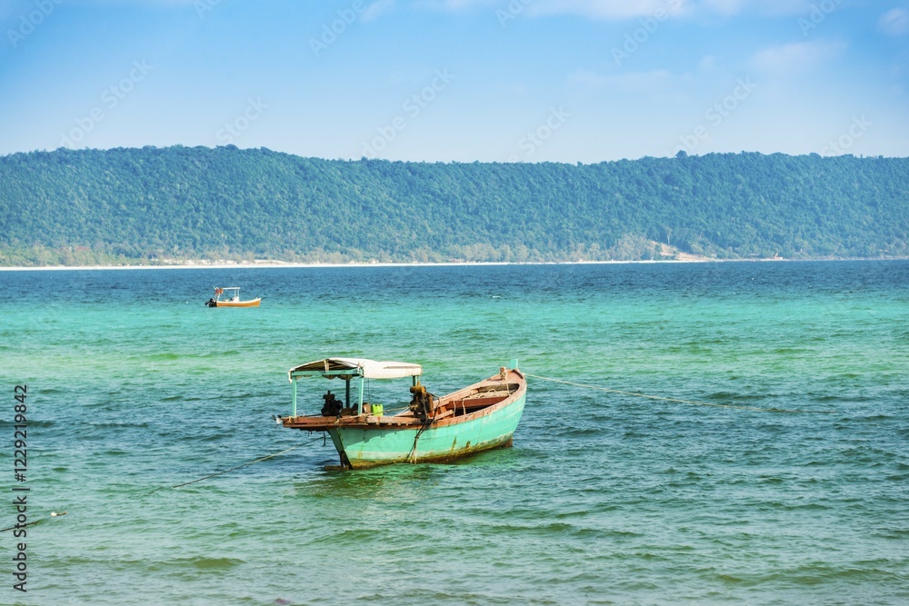 Fototapeta premium Traditional long-tail boat in turquoise sea, Long Beach, Sok San Village, Koh Rong Island, Krong Preah Sihanouk, Sihanoukville, Cambodia, Asia