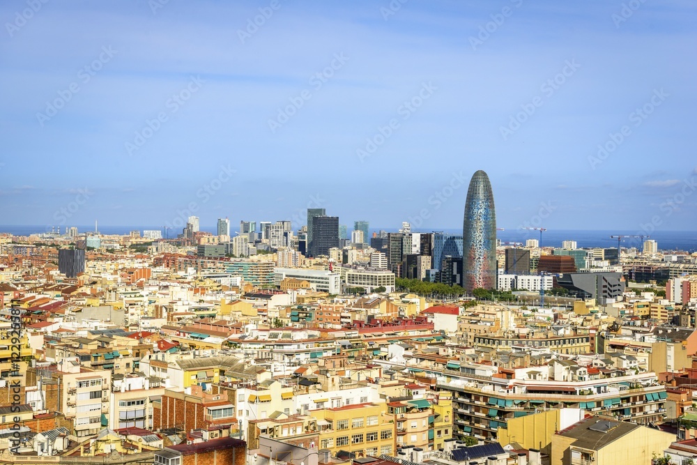 Fototapeta premium City view with houses and Torre Agbar by architect Jean Nouvel, from the Sagrada Familia, Barcelona, Catalonia, Spain, Europe