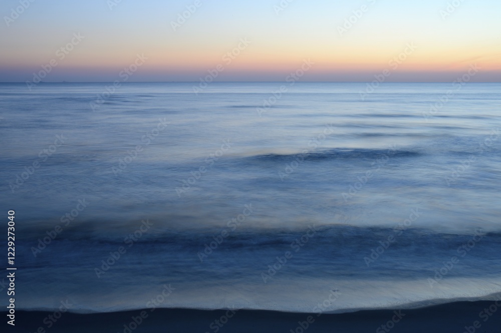 Obraz premium Sunset at the North Sea, Texel, North Holland, Netherlands