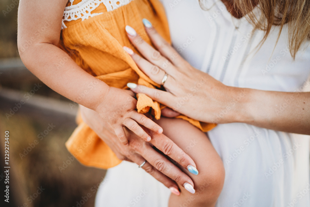 Fototapeta premium Close up hands mom toddler girl daughter