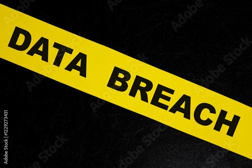 Obraz na płótnie Data breach alert, caution and warning concept. Yellow barricade tape with word in dark black background. w salonie