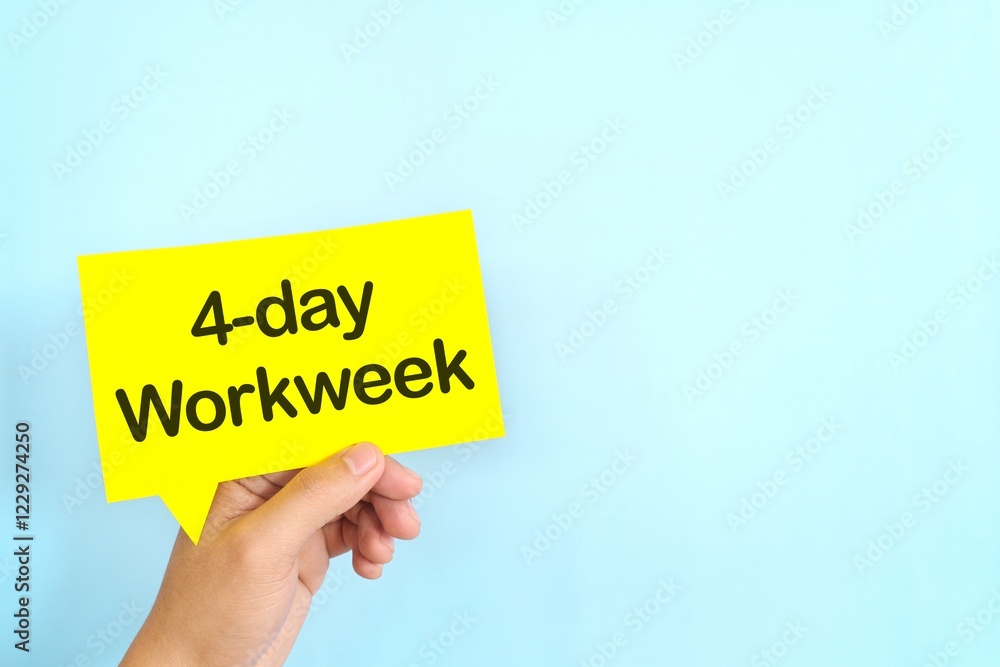 Human hand holding yellow speech bubble with written 4-day work week.