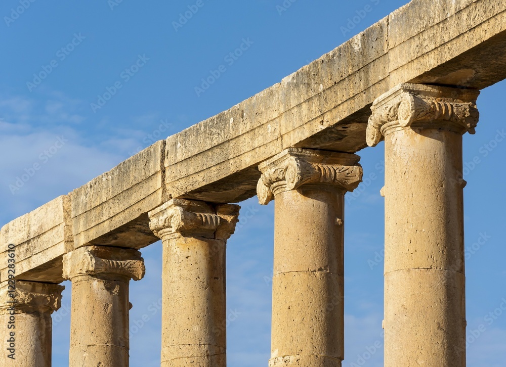 Fototapeta premium Close-up of columns and capitals at Oval Plaza, Forum, Jerash, Jordan, Asia