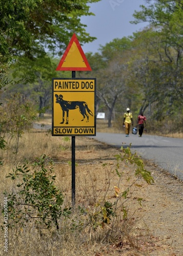 Warning Sign Painted dog, Attention African Wild Dogs, Hwange National Park, near Hwange, Matabeleland North Province, Zimbabwe, Africa photo