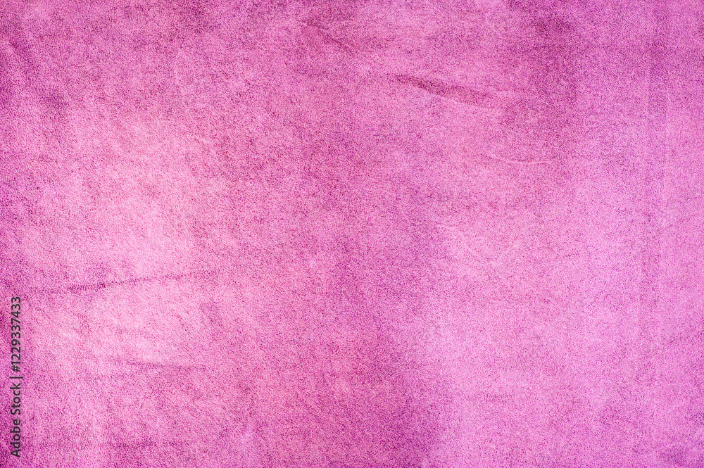 Fototapeta premium Raspberry pink suede background. Light pink purple suede leather macro photo.