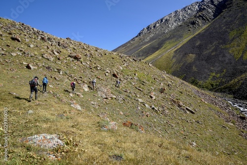 Hikers in the West Karakol Valley, Tien Shan Mountains, Naryn region, Kyrgyzstan, Asia photo