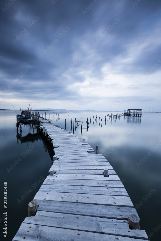 Naklejka premium Landing stage in the calm sea, evening mood, Carrasqueira, Alcacer do sal, Portugal, Europe