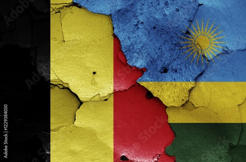 Obraz na płótnie Flags of Belgium and Rwanda painted on cracked wall w salonie