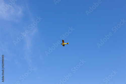 Superlight private plane flies in the sky