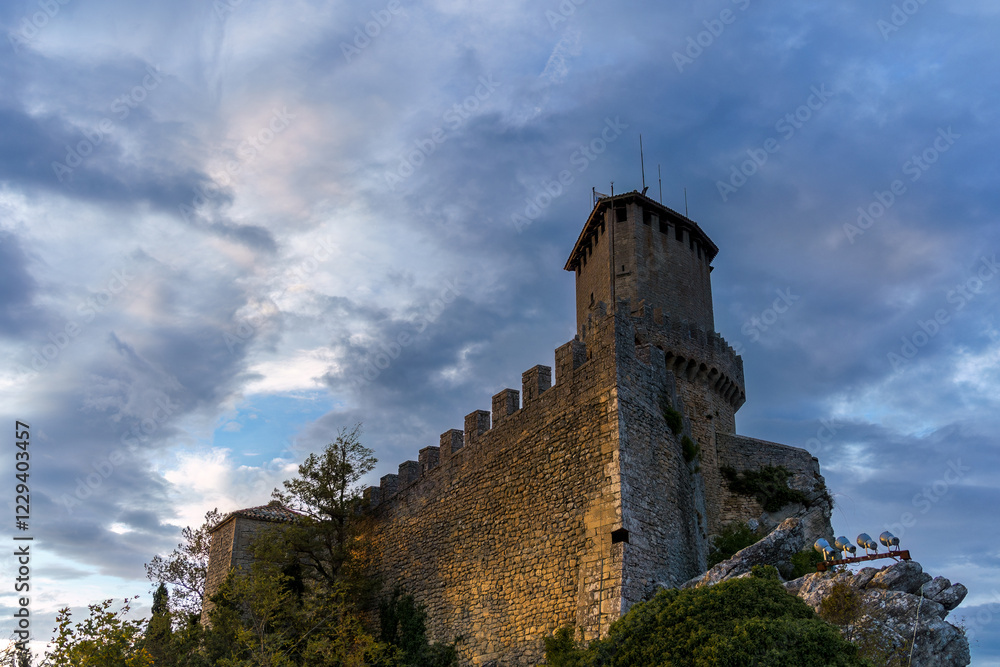 Fortress of Guaita under a cloudy blue sky in San Marino Fortress of Guaita under a cloudy blue sky in San Marino