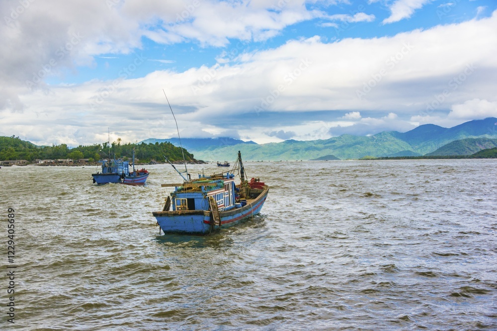 Obraz premium Blue fishing boats, fishing boats on the water, Nha Trang, Khánh Hòa Province, Vietnam, Asia