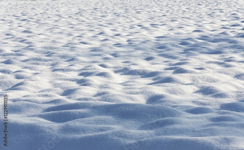 Bild auf Leinwand Snow, bumpy ground with light and dark areas