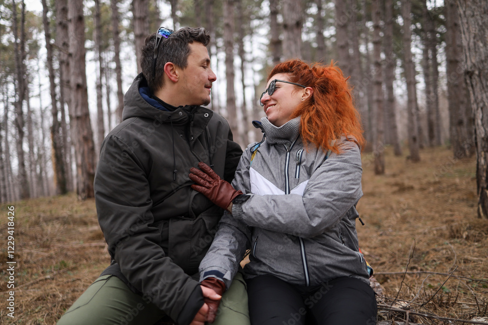 A couple smiling at each other on a Valentine's Day. A couple smiling at each other on a Valentine's Day.