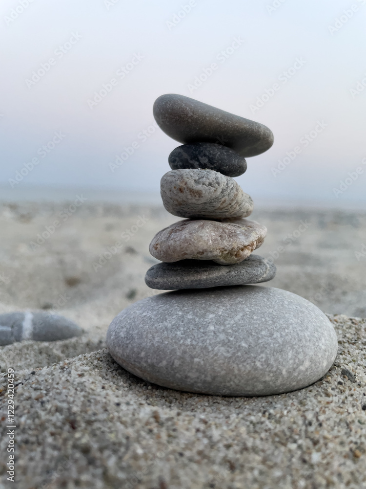 Concept of the harmony, patience, and the delicate art of equilibrium. The balance of nature in a quiet moment. Concept of the harmony, patience, and the delicate art of equilibrium. The balance of nature in a quiet moment.