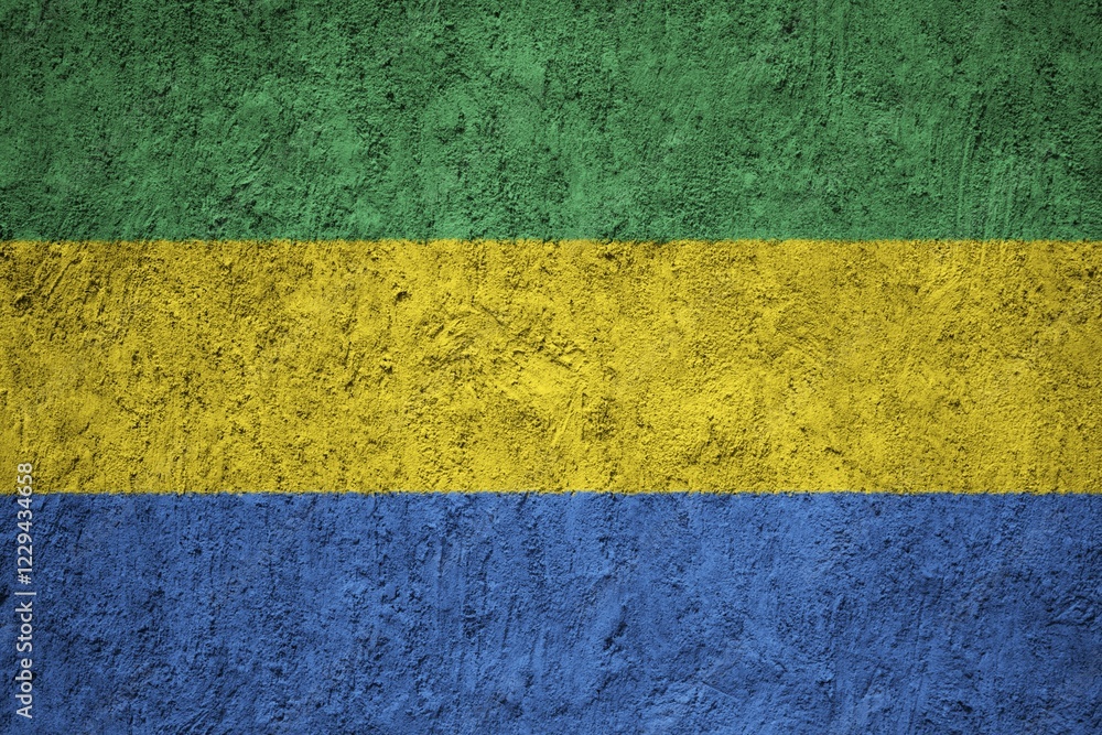 Gabon Flag painted on the cracked grunge concrete wall Gabon Flag painted on the cracked grunge concrete wall