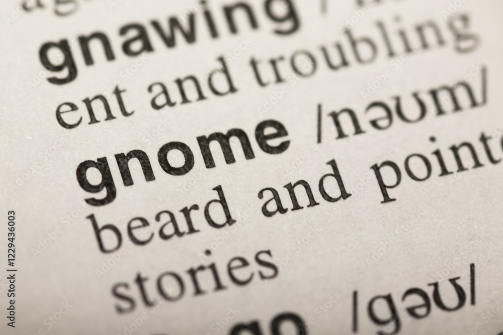 Gnome, word in dictionary. macro shot. selective focus Gnome, word in dictionary. macro shot. selective focus