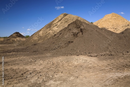 Mounds of sand in a commercial sandpit, Quebec, Canada, North America photo