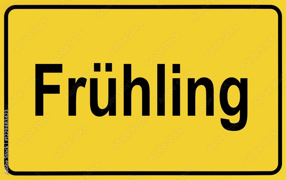 Town sign, German lettering Fruehling, symbolic of beginning of spring Town sign, German lettering Fruehling, symbolic of beginning of spring