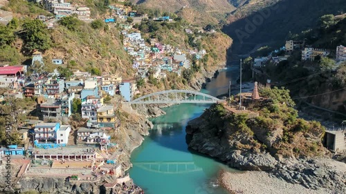 view from the top of the top of the mountain. Houses in mountains. Devprayag - the meeting of two rivers flow in as ganges or ganga river photo