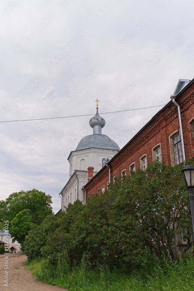 Fototapeta premium Valaam Island, Russia, July 12, 2024. Street along the monastery wall.