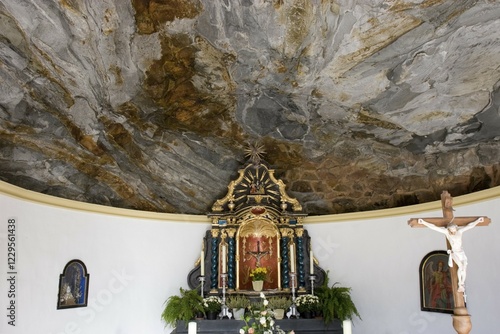 Rock chapel in Gschlöss im National park Hohe Tauern Tyrol Austria photo