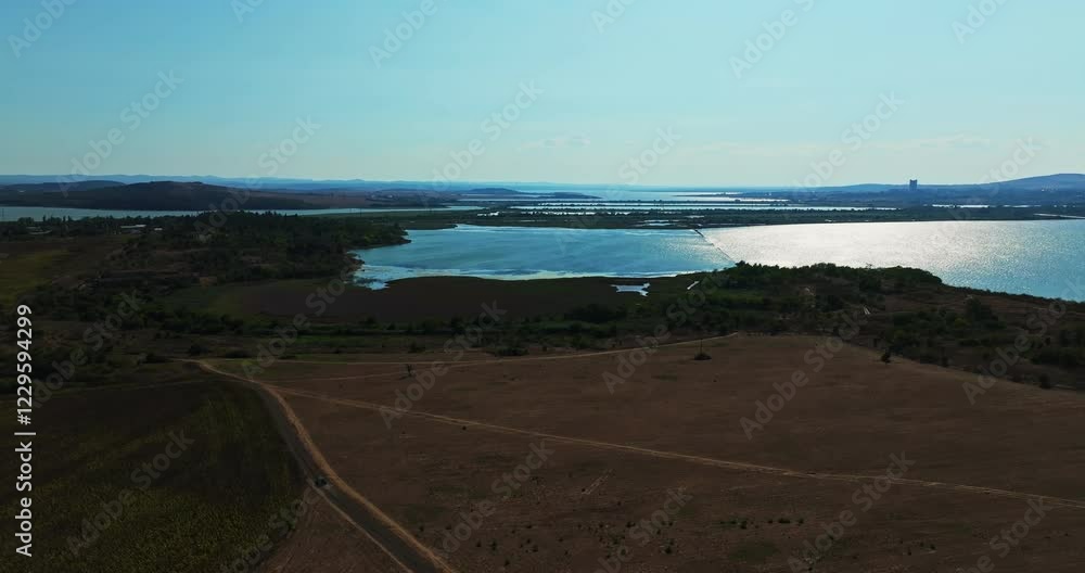 Cinematic Aerial Car Driving On Dirt Road On A Hot Summer Day Near Burgas Bulgaria Cinematic Aerial Car Driving On Dirt Road On A Hot Summer Day Near Burgas Bulgaria