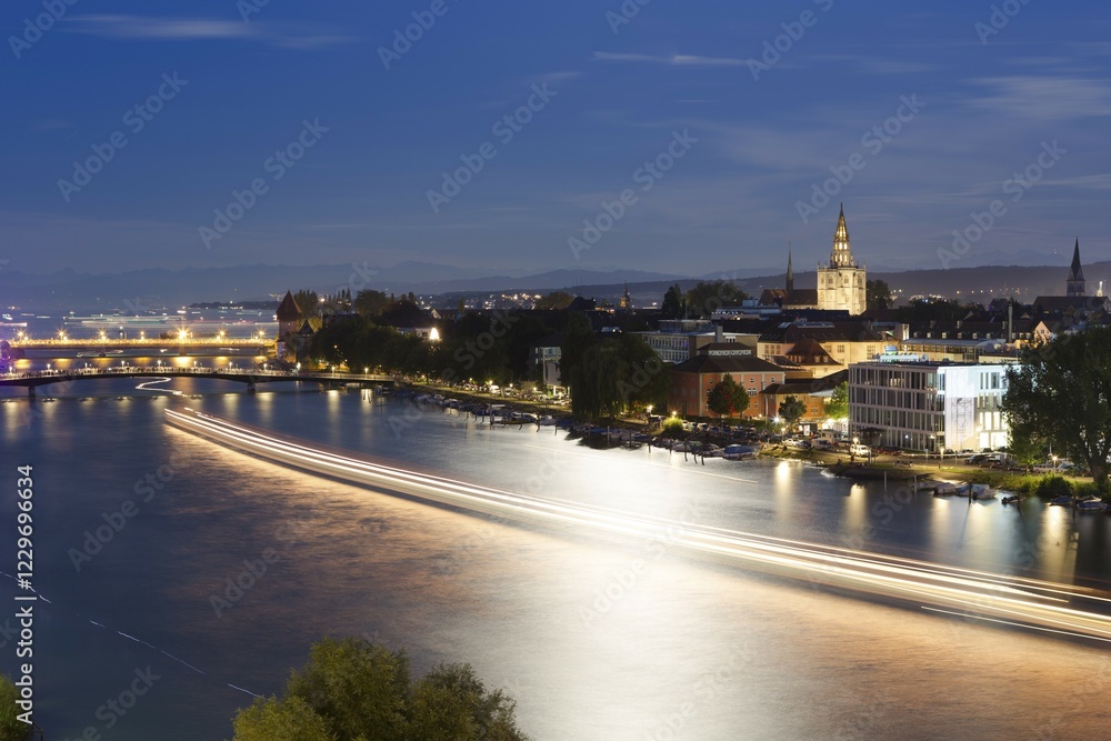 Obraz premium Light tracers of ships on the Rhine River during the Seenachtfest Festival, Constance Minster at the rear, Konstanz, Baden-Württemberg, Germany, Europe