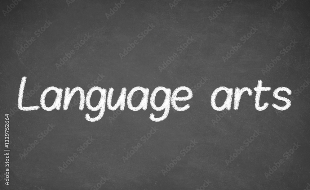 Language arts lesson on blackboard or chalkboard. written in white chalk Language arts lesson on blackboard or chalkboard. written in white chalk