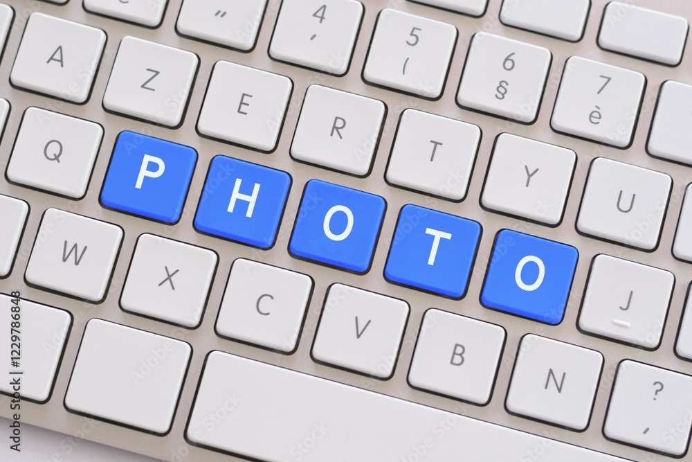 Photo in blue on white keyboard Photo in blue on white keyboard