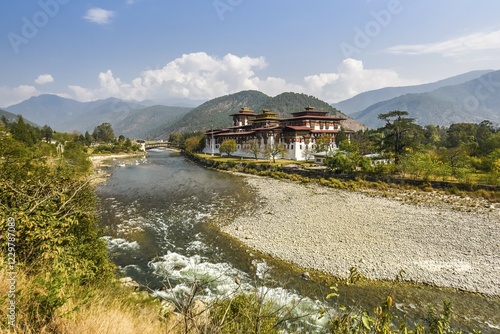 Buddhist monastery fortress Punakha Dzong at the river Mo Chhu, Punakha, Bhutan, Asia photo