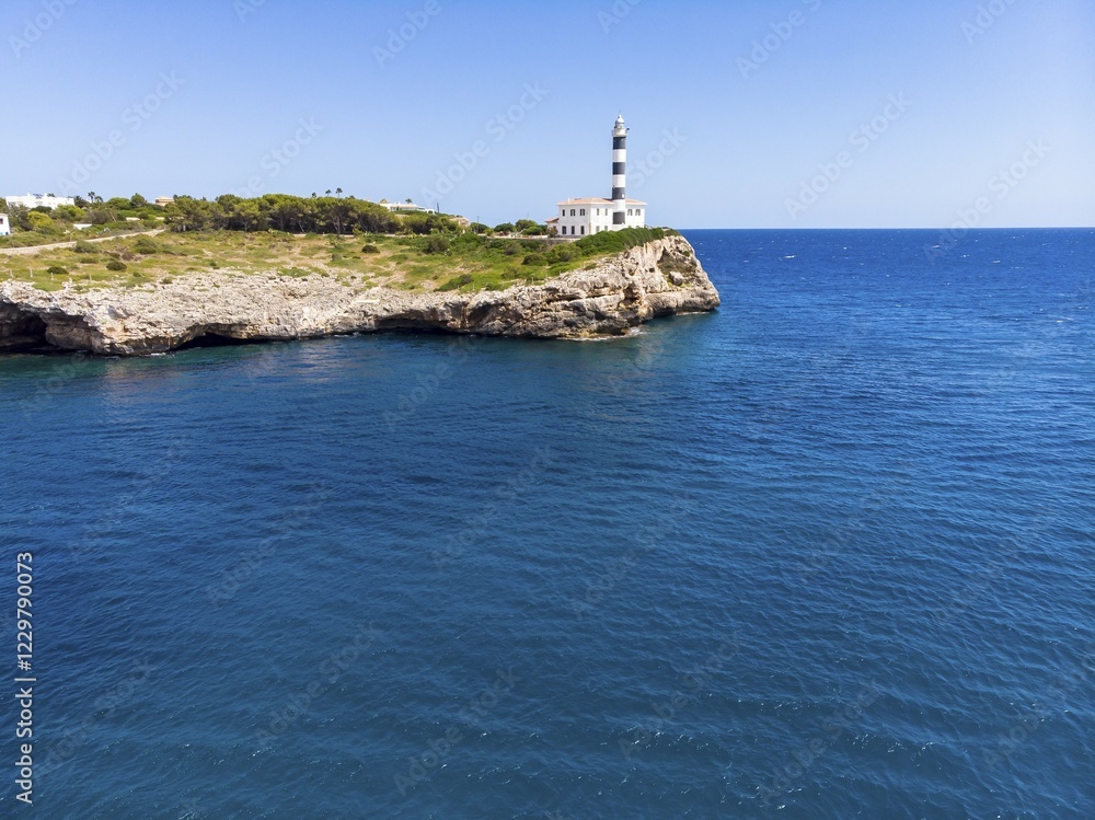Aerial view, lighthouse Portocolom, Punta de ses Crestes, Potocolom, Majorca, Balearic Islands, Spain, Europe Aerial view, lighthouse Portocolom, Punta de ses Crestes, Potocolom, Majorca, Balearic Islands, Spain, Europe