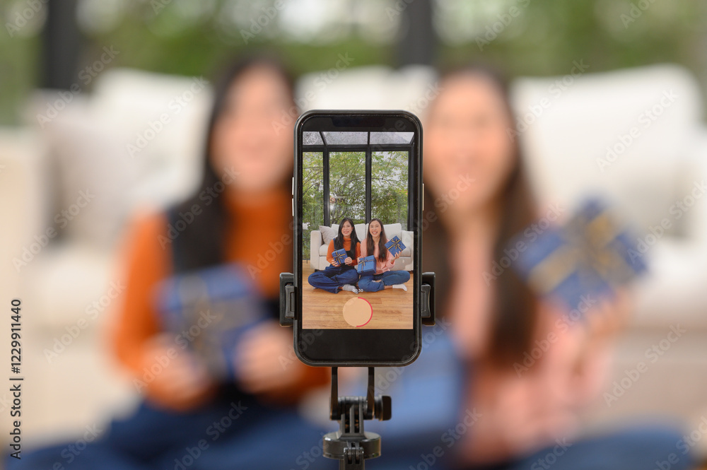 Obraz premium People happily holding gift boxes on New Year's Day and Valentine's Day.