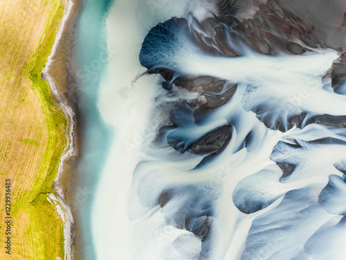 Abstract patterns in a river from a glacier.
