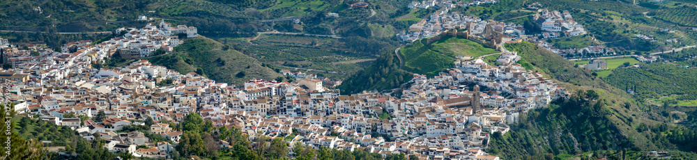 Panoramic view from above on the Andalusian white town of Alora, Spain, in a green winter landscape Panoramic view from above on the Andalusian white town of Alora, Spain, in a green winter landscape