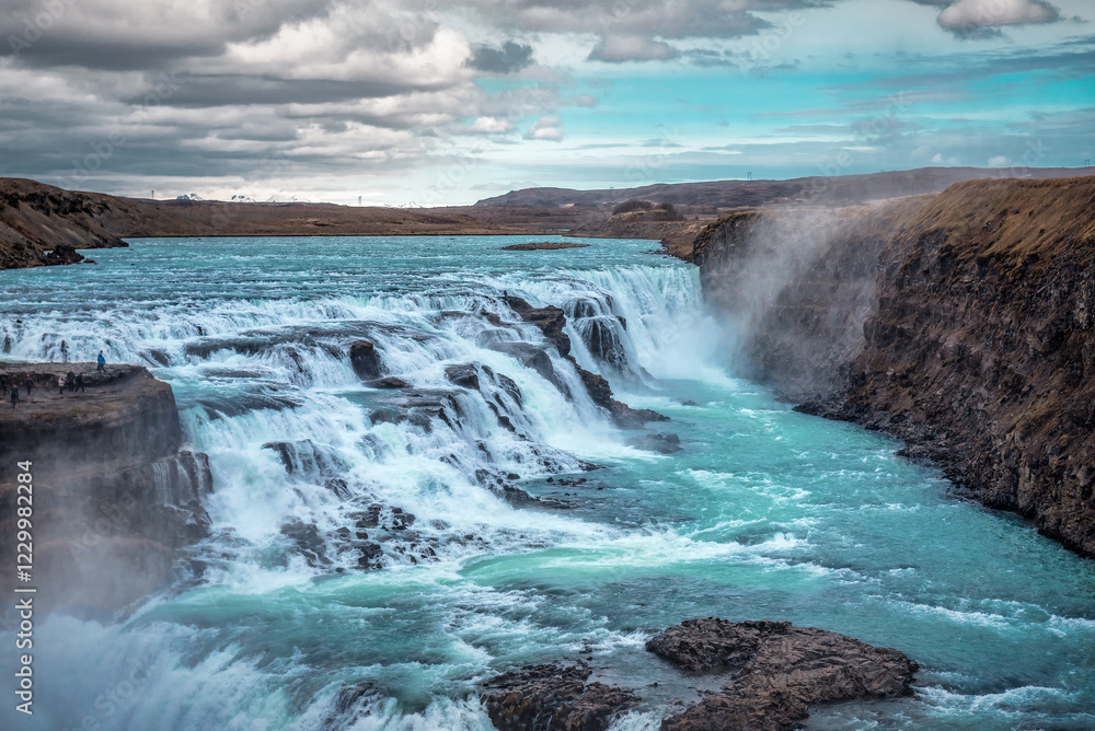 View of popular tourist destination - Gullfoss waterfall. Spectacular Hvita river. Iceland View of popular tourist destination - Gullfoss waterfall. Spectacular Hvita river. Iceland