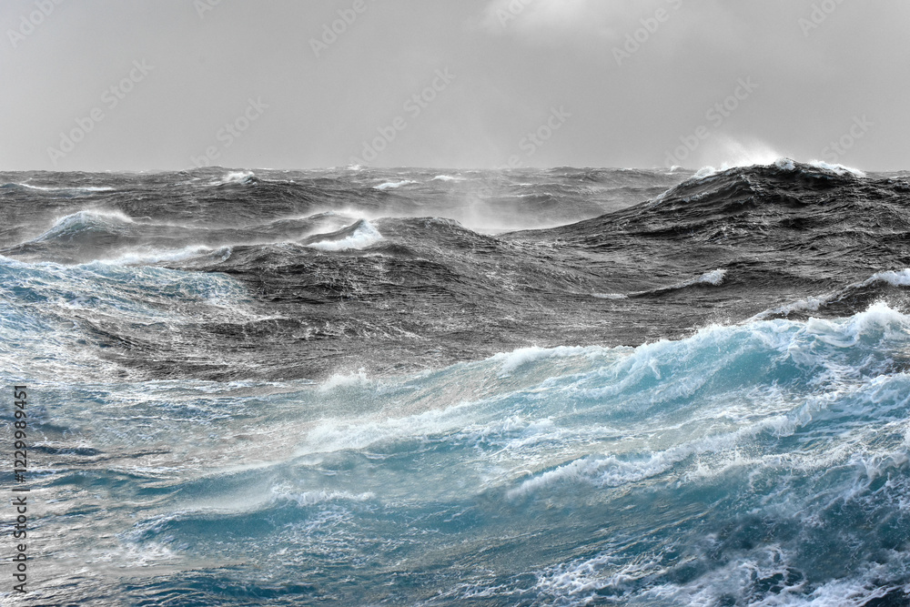 Naklejka premium Rough seas. Waves and spray.