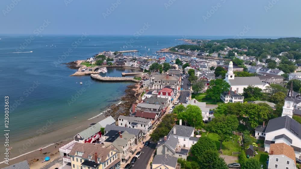 Rockport Harbor aerial view including Bearskin Neck and Motif Number 1 building in historic waterfront village of Rockport, Massachusetts MA, USA. Rockport Harbor aerial view including Bearskin Neck and Motif Number 1 building in historic waterfront village of Rockport, Massachusetts MA, USA.