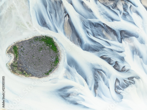 Abstract patterns in a river from a glacier.
