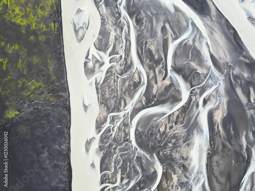 Abstract patterns in a river from a glacier.
