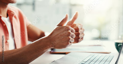 Laptop, thumbs up and video call with business person at desk in office for virtual meeting or webinar. Agreement, deal and success with design employee in creative workplace for feedback or support