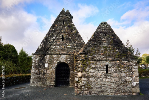 Ancient stone church in Glendalough, Wicklow Mountains, Ireland, with medieval architecture