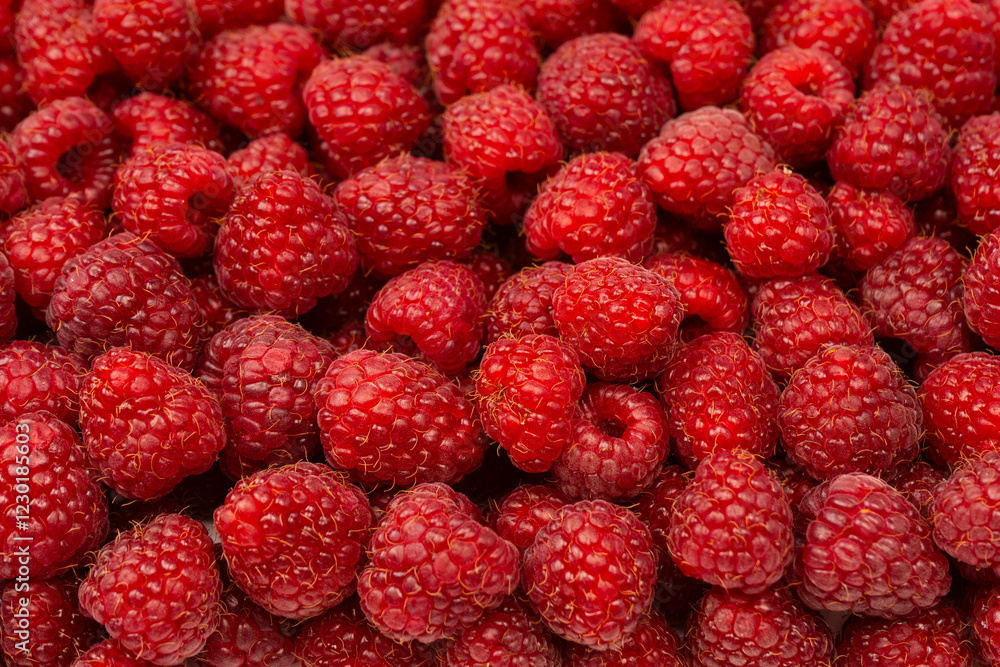 Tasty fresh raspberry as a background. Tasty fresh raspberry as a background.