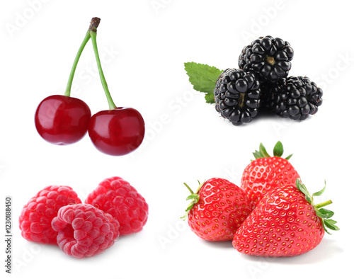 Cherries, raspberries, blackberries and strawberries isolated on white photo