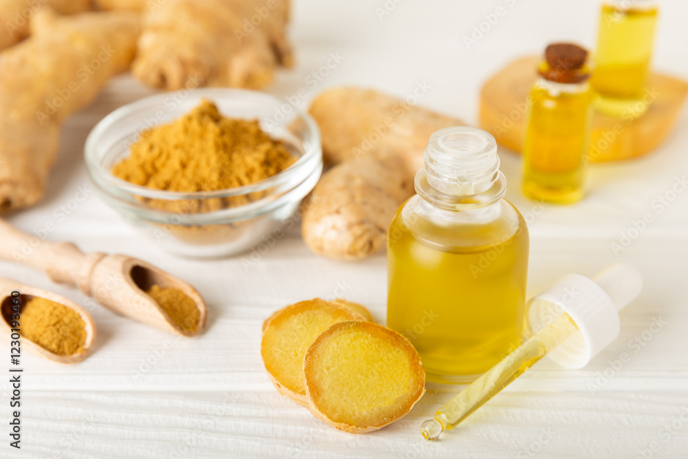 Ginger essential oil on texture background. Fresh ginger slices. Essence, serum, oil. Alternative medicine. Phytotherapy. Health and beauty concept. Place for text. Copy space. Ginger essential oil on texture background. Fresh ginger slices. Essence, serum, oil. Alternative medicine. Phytotherapy. Health and beauty concept. Place for text. Copy space.