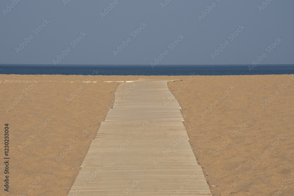 Ταπετσαρία Las Piscinas, in Sardinia, is a stunning beach with golden dunes, crystal-clear waters, and a wild, untouched landscape
