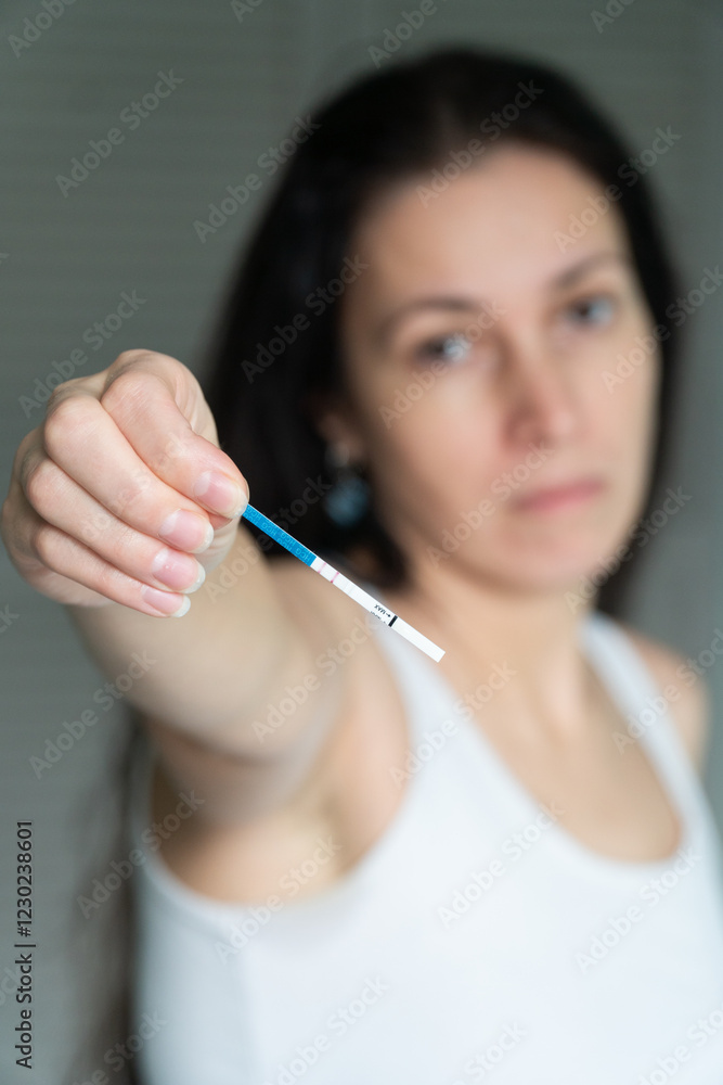 woman with pregnancy test, unwanted pregnancy, sad girl woman with pregnancy test, unwanted pregnancy, sad girl