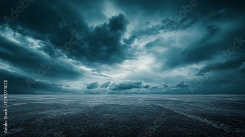 A dramatic nighttime horizon with a dark concrete floor, framed by an expansive sky filled with striking clouds, evoking a cinematic atmosphere