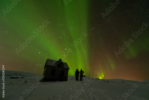 Northern Lights over a snow hut