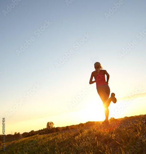 Fitness cardio, woman and running outdoor for marathon training, healthy body and sprinting challenge. Mockup, back and exercise on low angle for jog, workout performance and competition endurance photo